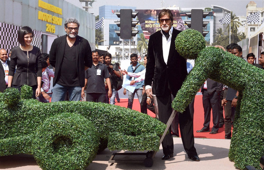 CARS AND STARS: Film director R. Balki (c), actress Akshara Haasan (l) and Bollywood superstar Amitabh Bachchan during the inauguration of Mumbai International Motor Show, in Mumbai, Feb. 5. (Mitesh Bhuvad | PTI)