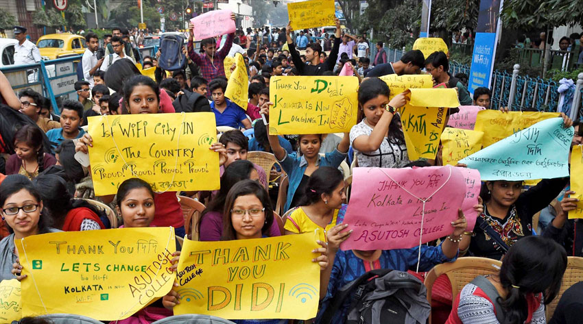 FREE TO ROAM: People display placards at the inauguration of first Wi-Fi City in Kolkata, Feb. 5. (Ashok Bhaumik | PTI)