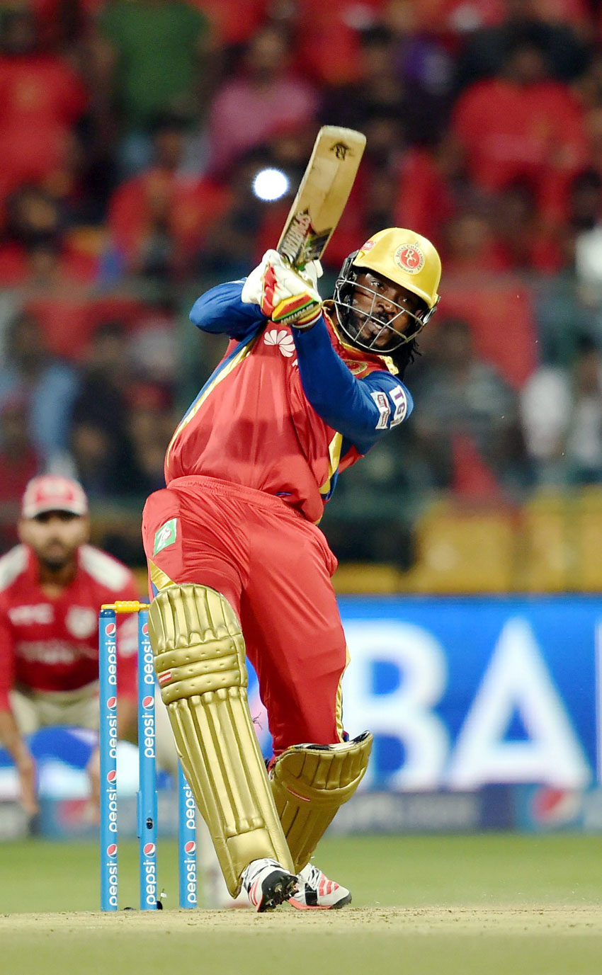 Royal Challengers Bangalore player Chris Gayle  plays a shot during IPL 8 match against Kings XI Punjab in Bengaluru, May 6. (Shailendra Bhojak | PTI)