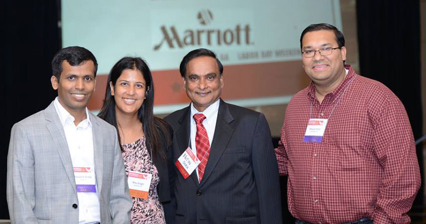PAGE NETIP 02 NetIP NA 2014 executive team members Manjesh Reddy, Ritu Singh, and Dhaval Shah with Fast Pitch Competition Judge Nitin Shah at the 2014 Annual NetIP NA Conference in Atlanta, GA. (ByteGraph Productions)