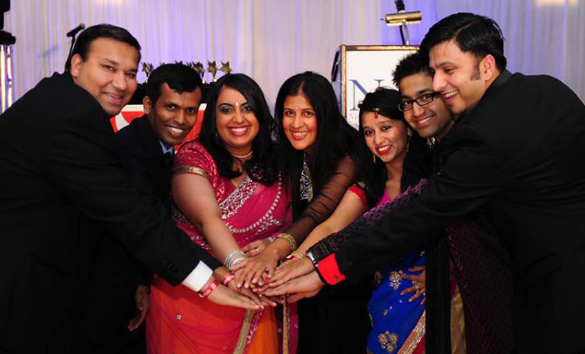 PAGE NETIP 03 NetIP NA 2014 executive team members Manjesh Reddy, Ritu Singh, and Dhaval Shah with Fast Pitch Competition Judge Nitin Shah at the 2014 Annual NetIP NA Conference in Atlanta, GA. (ByteGraph Productions)