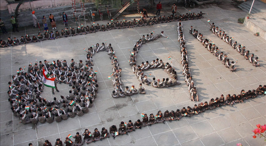 PAGE INDIA TERROR 02 School children make a formation that reads “26/11” to pay their tributes to the victims of Mumbai terror attacks in Jammu, Nov. 26. (Press Trust of India)