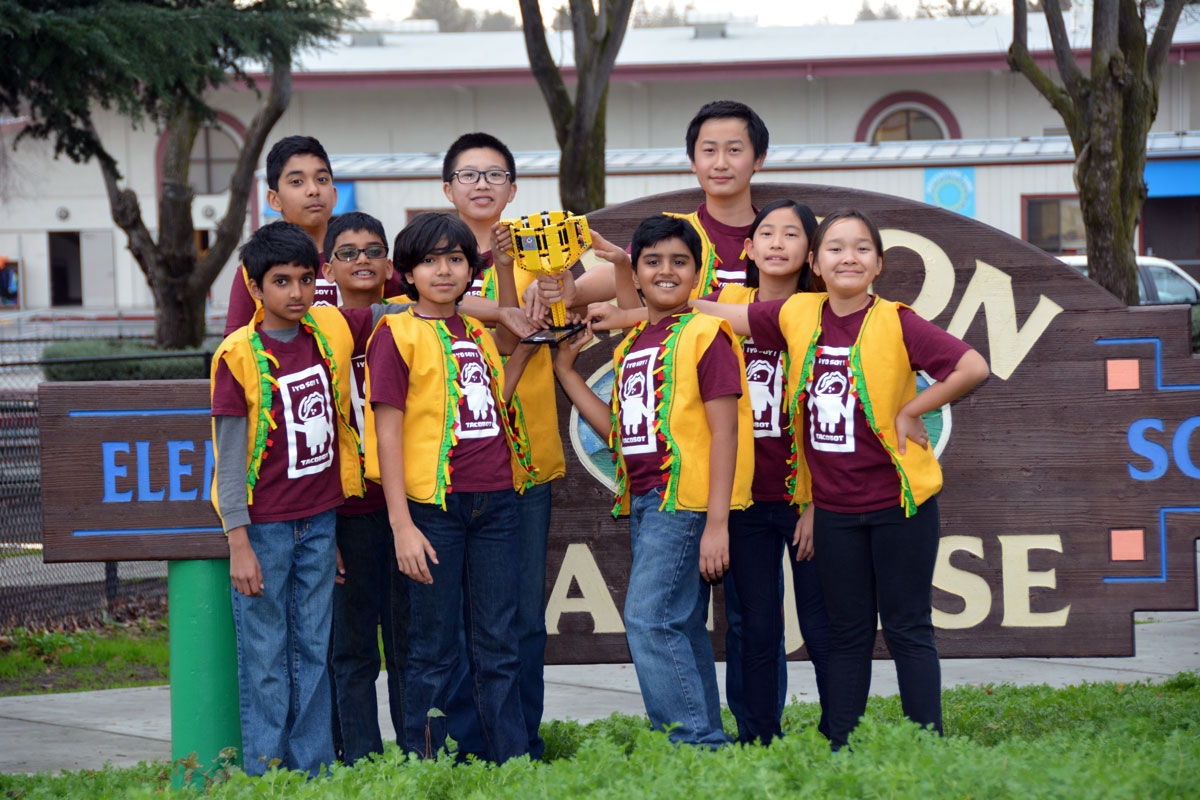The Tacobots Team – (l-r): Abhinav Raghavendra, Mrinaal Ramachandran, Prakrit Ramachandran, Vikrant Bajaj, Jeffrey Liu, Ishan Gohel, Ryan Wu, Amelie Wu and Carolyn McNay. (Sejal Gohel)