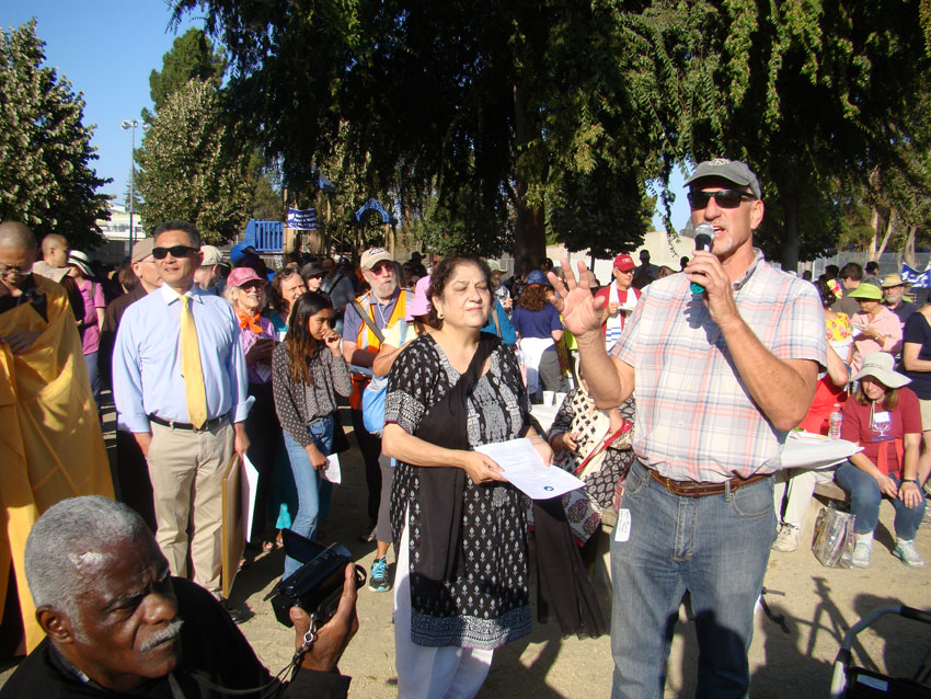 PAGE RAS PALOALTO 04 Palo Alto Mayor Patrick Burt speaks as Samina Sundas listens.