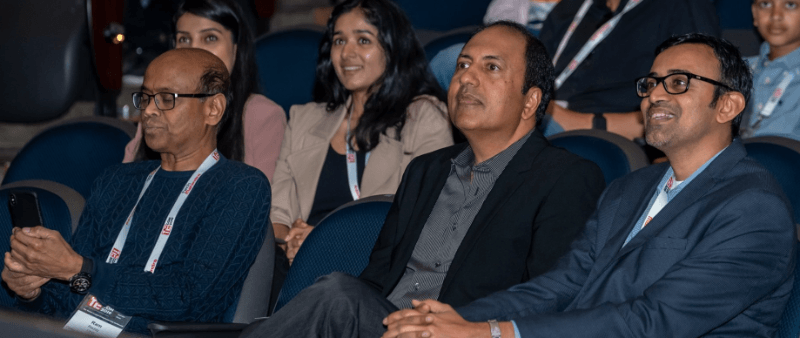 TiECON 2019 02 (L-r) Former TiE President, Ram Reddy, Current TiE President, BJ Arun, and a TiEcon 2019 Attendee at the Young Entrepreneurs Track (Photo: INDTVUSA)