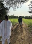 My family walking towards our orchard on a dirt path in Anjanapuram, Telangana (All Photos: Sahana Nagadala)