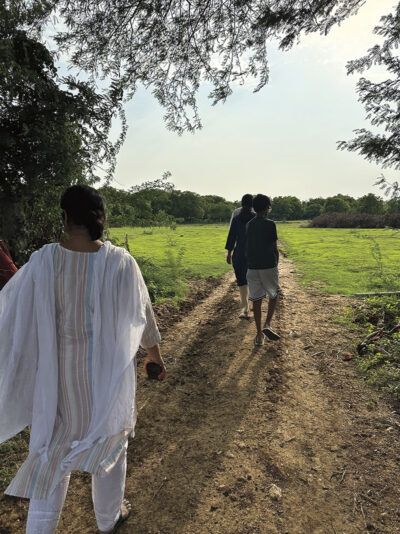 My family walking towards our orchard on a dirt path in Anjanapuram, Telangana (All Photos: Sahana Nagadala)