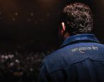 Page Ent Papa Yaar Zakir Khan facing the audience during "Papa Yaar." (Netflix)