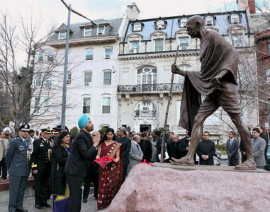 Indian Ambassador to the U.S. Navtej Sarna paying floral tributes at the statue of Mahatma Gandhi at the Indian Embassy on the occasion of India's 68th Republic Day, in Washington, D.C., Jan. 26. (Press Trust of India) page-2017-india-republic-day-58
