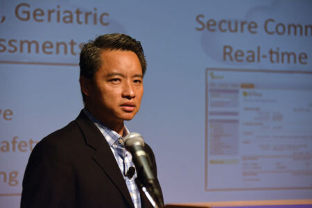 Alex Go, co-founder and CEO of LivWell Health makes a pitch about his company to the panel at Boomers Venture Summit, June 30. (Amar D. Gupta | Siliconeer) page-boomers-06-alex-po-pitch-dsc_9494