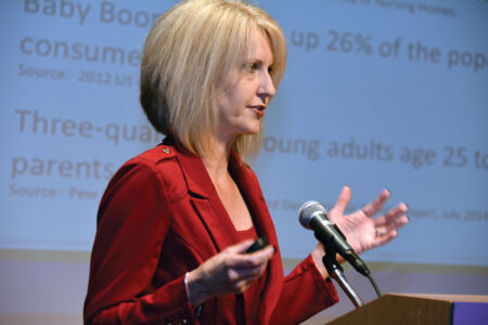 Kim Ashbaugh, director Next Gen brand management, Lennar, talked about multigenerational housing, and how the trend was catching up. (Amar D. Gupta | Siliconeer) page-boomers-10-kim-dsc_9485