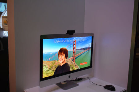 Visitors can learn the basics of Photoshop by creating a "selfie" with a celebrity. Visitors choose a background, take a selfie and select a celebrity to create a unique scene in Photoshop. Visitors can email their creation to friends or post it to the "big screen" to share with everyone in the gallery. page-computer-11