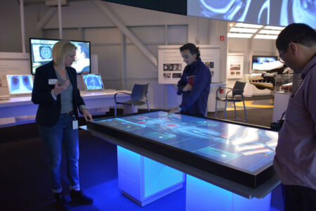 Can you diagnose the patient’s problem? Select a highlighted body part from a life-size full-body MR image on a large multi-user flat screen. Scroll through consecutive images and compare the patient’s MRI with a healthy one. Can you spot the problem by comparing the images? Try to complete all 5 challenges. (Amar D. Gupta/Siliconeer) page-computer-16