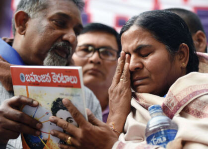 Rohith Vemula's mother, Radhika, breaks into tears during a protest rally over her son's suicide at Jantar Mantar in New Delhi, Feb. 23. (Manvender Vashist | PTI) page-cover-jnu-12