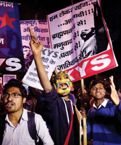 JNU students celebrate after Delhi High Court granted bail to JNUSU president Kanhaiya Kumar at Parliament Street in New Delhi, Mar. 2. (Kamal Kishore | PTI) page-cover-jnu-26