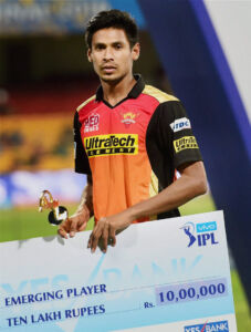 Sunrisers Hyderabad pacer Mustafizur Rehman after receiving the Emerging Player trophy during the award ceremony of the IPL 2016 Final match at Chinnaswamy Stadium in Bengaluru, May 29. (Shailendra Bhojak | PTI) page-cricket-ipl9-17