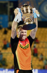Sunrisers Hyderabad David Warner poses with the IPL 2016 trophy during the award ceremony of final match at Chinnaswamy Stadium in Bengaluru, May 29. (Shailendra Bhojak | PTI) page-cricket-ipl9-18