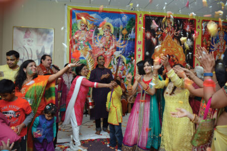 Dadi Pariwar USA Holi with flowers. page-holi-03-dadipariwar