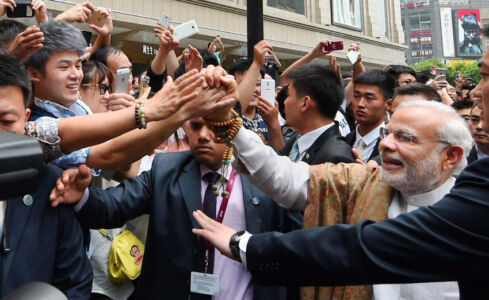 Prime Minister Narendra Modi interacting with the people near the Daxingshan temple in Xi'an, China, May 14. (Shahbaz Khan | PTI) page-may21-modi-10-china