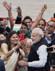 Prime Minister Narendra Modi interacting with Indian community on his arrival at Seoul Air Base, in Seoul, South Korea, May 18. (Shahbaz Khan | PTI) page-may21-modi-26-korea