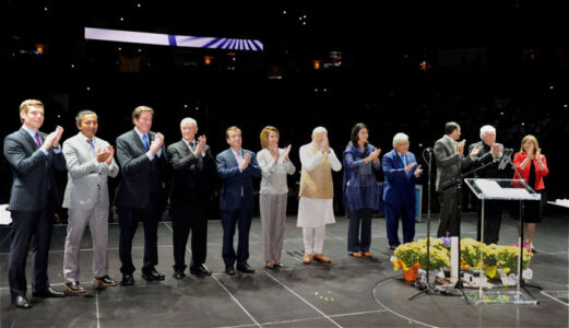 Prime Minister Modi greets the audience as the top U.S. politicos welcome PM Modi at SAP Center in San Jose, Calif., Sept. 27. (Press Trust of India) page-modi-02-pti