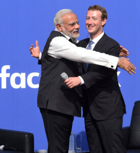 Prime Minister Narendra Modi hugs Facebook CEO Mark Zuckerberg at Facebook headquarters in Menlo Park, Calif., Sept. 27. (Subhav Shukla | PTI) page-modi-05-pti