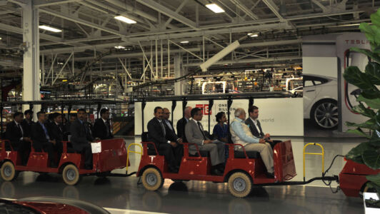 The Modi delegation takes a tour of the electric carmaker Tesla Motors plant in Fremont, Calif., Sept. 26. page-modi-09