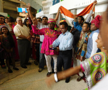 Supporters in a festive mood, ready to greet Prime Minister Modi at the SAP Center, Sept. 27. (Vansh A. Gupta | Siliconeer) page-modi-24-vag