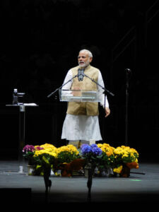 Indian Prime Minister Narendra Modi (@narendramodi) addressing the 18,000 plus crowd at the SAP Center in San Jose, Calif., Sept. 27. He is the first Indian Prime Minister to visit the Silicon Valley, even though the Valley has had a significant Indian presence for decades. The supporters roared and cheered with chants of “Modi! Modi!” as he spoke extempore for almost an hour, talking about his various initiatives and programs for the betterment of India. (Vansh A. Gupta | Siliconeer) page-modi-26-vag