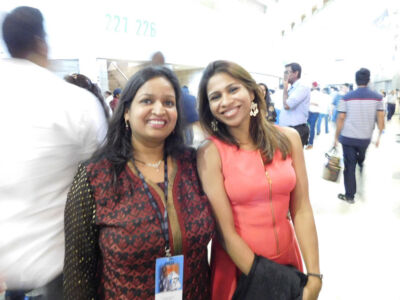 Siliconeer co-publisher Seema Gupta (l) and Sonal Banka in a festive mood, ready to greet Prime Minister Modi at the SAP Center, Sept. 27. (Vansh A. Gupta | Siliconeer) page-modi-27-vag