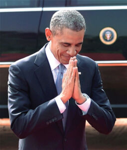President Barack Obama folds his hands in a traditional “Namaste” during his ceremonial welcome at Rashtrapati Bhavan in New Delhi, Jan. 25. (Vijay Verma | PTI Photo) page-modi-obama-04