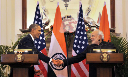 Prime Minister Narendra Modi and President Barack Obama shake hands during their joint press conference at Hyderabad House in New Delhi, Jan. 25. (Press Trust of India) page-modi-obama-22