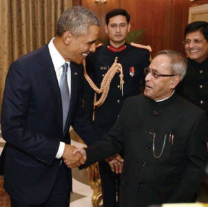 President Pranab Mukherjee and President Barack Obama shake hands at a meeting at the Rashtrapati Bhavan in New Delhi, Jan. 25. (Shahbaz Khan | PTI) page-modi-obama-23