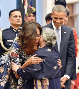 U.S. President Barack Obama looks on as U.S. First Lady Michelle Obama greets former Prime Minister Manmohan Singh's wife, Gursharan Kaur, during a banquet hosted in his honor at the Rashtrapati Bhavan in New Delhi, Jan. 25. (Vijay Verma | PTI) page-modi-obama-31