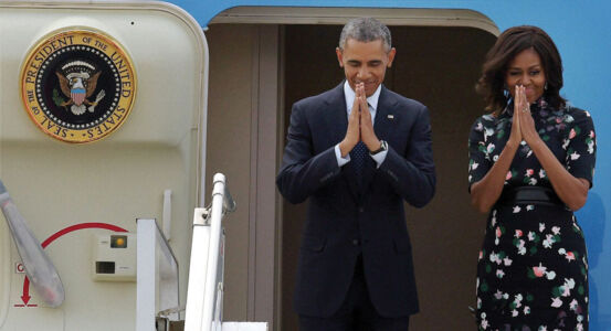 U.S. President Barack Obama and First Lady Michelle Obama fold their hands in a traditional Indian “Namaste” aboard the Air Force One, before their departure from Air Force Station Palam in New Delhi, Jan. 27. (Manvender Vashist | PTI) page-modi-obama-37
