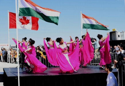 Artists welcome Prime Minister Modi and his Canadian counterpart on their arrival in Toronto, Apr. 15. (Subhash Chander Malhotra | PTI) page-modi-toronto-06-inside