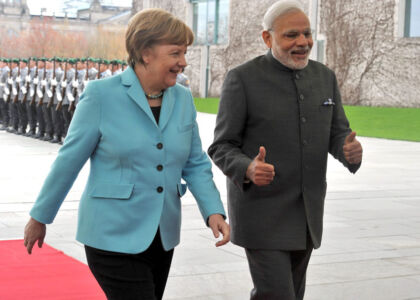 Prime Minister Narendra Modi with German Chancellor Angela Merkel during a ceremonial reception at the chancellery in Berlin, Germany, Apr. 14. (Press Trust of India) page-modi-xberlin-11-inside