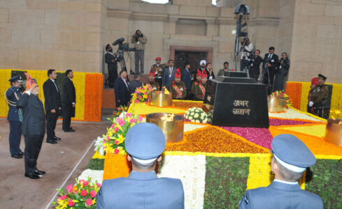 Prime Minister Narendra Modi paying homage at the Amar Jawan Jyoti, India Gate, at the 66th Republic Day Parade, in New Delhi, Jan. 26. (Press Information Bureau) page-repday01-pib-l2015012661586