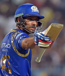 Mumbai Indian batsman Rohit Sharma raises his bat after completing his half-century during IPL2015 Finals against CSK at Eden Gardens in Kolkata, May 24. (Ashok Bhaumik | PTI) page-sports-cricket-2015iplchamps-03
