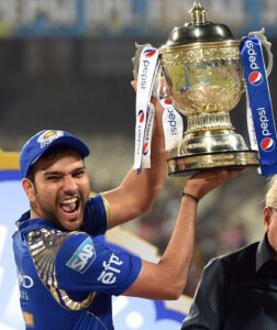 Mumbai Indians captain Rohit Sharma celebrates with trophy after winning IPL8 final against Chennai Super Kings at Eden Garden in Kolkata, May 24. (Ashok Bhaumik | PTI) page-sports-cricket-2015iplchamps-07