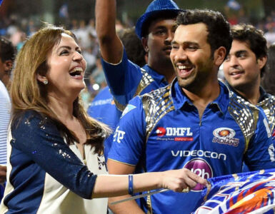Mumbai Indians team owner Neeta Ambani and captain Rohit Sharma celebrate their IPL 2015 win at Wankhede Stadium in Mumbai, May 25. (Santosh Hirlekar | PTI) page-sports-cricket-2015iplchamps-09