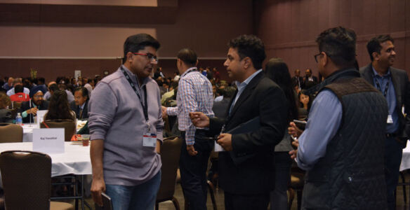 Entrepreneurs connecting in a separate hall. page-tie-02
