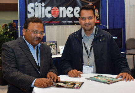 Siliconeer co-founder Amar D. Gupta chats with Amit Agarwal, global software and platforms executive at Entefy, during #TiECon2016. page-tie-08