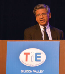 Vish Mishra of #TiESV introducing Vishal Sikka of Infosys who was one of the grand keynote speakers but was unable to make it in person as he had to accompany Prime Minister Modi to China. He addressed the audience in a pre-recorded video. The keynote was presented as a panel of senior Infosys team who spoke on “Rethinking IT Services.” Amar D. Gupta | Siliconeer page-tiecon2015-15