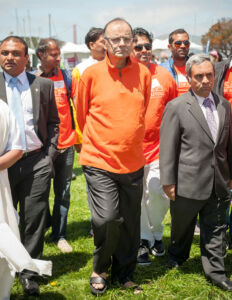Indian Finance Minister Arun Jaitley (c) graced the event, seen here with Consul General Ambassador Venkatesan Ashok (r) and Deputy Consul General Dr. K.J. Srinivasa (l) in San Francisco, June 21. (Mahendra Singh) page-yoga-day-12