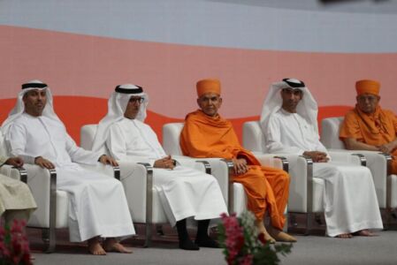 (L-r): Dr Ahmad bin Abdullah Humaid Belhoul Al Falasi, Dr Mugheer Khamis Al Khaili, Mahant Swami Maharaj, Dr Thani Ahmed Al Zeyoudi and Pujya Ishwarcharan Swami on stage during the assembly page-uae-baps-hindu-temple-04