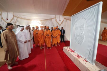 Mahant Swami Maharaj, Dr Mugheer Khamis Al Khaili, Dr Ahmad bin Abdullah Humaid Belhoul Al Falasi and Dr Thani Ahmed Al Zeyoudi unveil the Gift of Gratitude page-uae-baps-hindu-temple-11