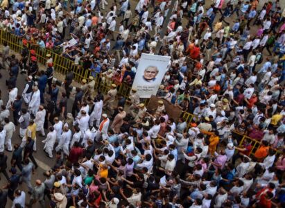 A sea of supporters attend the funeral procession of former prime minister Atal Bihari Vajpayee as his mortal remains are taken for cremation to Smriti Sthal, in New Delhi, Aug. 17. (Ravi Choudhary/PTI) page-vajpayee-main-gallery-06