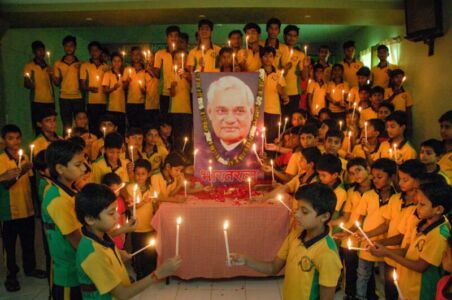 School children light candles to pay tribute to former Prime Minister Atal Bihari Vajpayee at a school in Mirzapur, Aug. 17. (PTI Photo) page-vajpayee-main-gallery-07