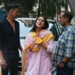 Akshay Kumar and Sara Ali Khan (c) pose during a meeting for "Atrangi Re," an upcoming movie by Anand L. Rai (r). (APHIMAGES)